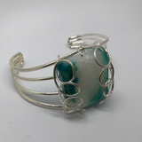 Semi precious stone bracelet set in silver wire