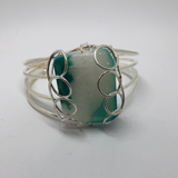 Semi precious stone bracelet set in silver wire