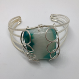 Semi precious stone bracelet set in silver wire